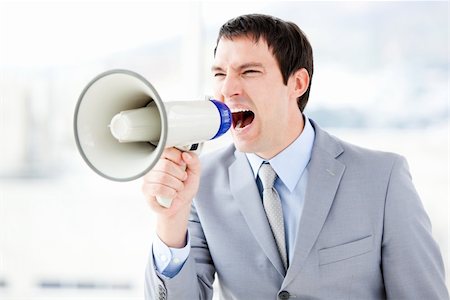 simsearch:400-04126489,k - Portrait of an angry businessman using a megaphone in the office Stock Photo - Budget Royalty-Free & Subscription, Code: 400-04187787