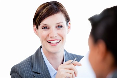 simsearch:400-04187842,k - Portrait of a caucasian  businesswoman talking with her colleague against a white background Stock Photo - Budget Royalty-Free & Subscription, Code: 400-04187822