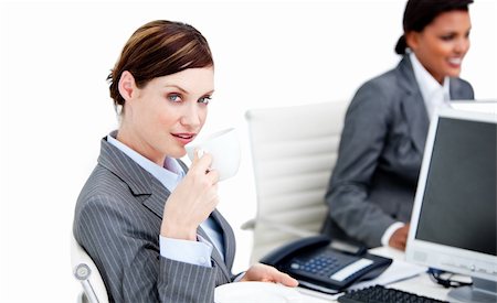 simsearch:400-04187842,k - Smiling businesswoman partners having a break drinking coffee in the office Stock Photo - Budget Royalty-Free & Subscription, Code: 400-04187848
