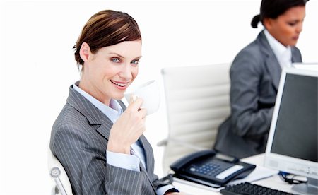 simsearch:400-04187842,k - Relaxed businesswoman partners having a break drinking coffee in the office Stock Photo - Budget Royalty-Free & Subscription, Code: 400-04187849