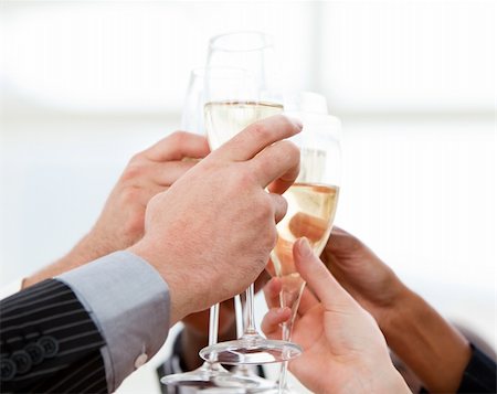 Close-up of businessmen celebrating an event with champagne in the company Foto de stock - Super Valor sin royalties y Suscripción, Código: 400-04187860