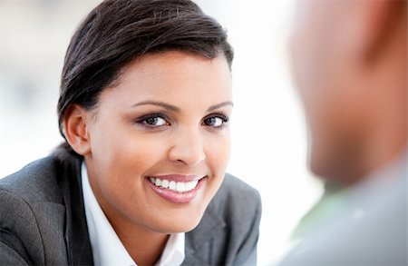 simsearch:400-04187842,k - Portrait of a pretty businesswoman talking with her colleague in the office Stock Photo - Budget Royalty-Free & Subscription, Code: 400-04187889