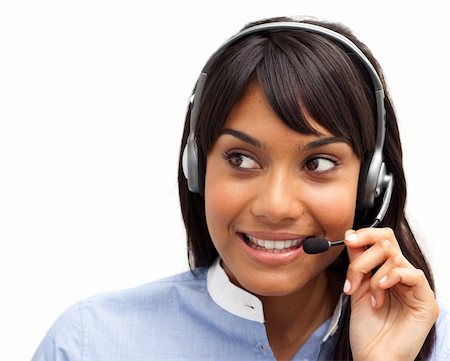 simsearch:400-04472832,k - Attractive ethnic customer service representative using headset at a computer Stock Photo - Budget Royalty-Free & Subscription, Code: 400-04187969