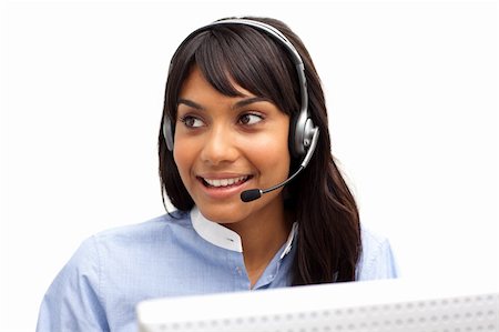 simsearch:400-03912315,k - Ethnic businesswoman with headset on in a call center Photographie de stock - Aubaine LD & Abonnement, Code: 400-04187970