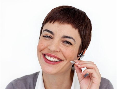 simsearch:400-04472832,k - Attractive customer service representative using headset against a white background Stock Photo - Budget Royalty-Free & Subscription, Code: 400-04188033