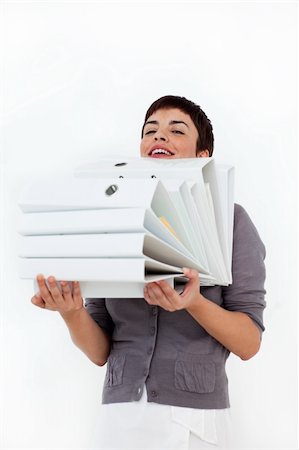 suited person holding paper up - Attractive businesswoman carrying a stack of folders against a white background Stock Photo - Budget Royalty-Free & Subscription, Code: 400-04188046