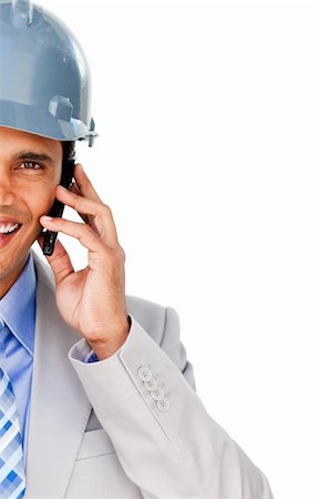 showing phones group - Close-up of an architect with a hardhat on phone isolated on a white background Stock Photo - Budget Royalty-Free & Subscription, Code: 400-04188143