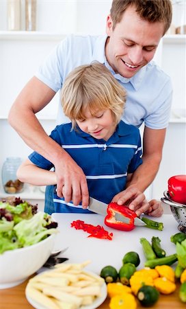 Little boy and his father cooking in the kitchen Stock Photo - Budget Royalty-Free & Subscription, Code: 400-04188219