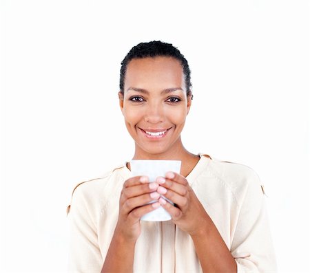 simsearch:400-04188263,k - Charming businesswoman holding a drinking cup against a white background Foto de stock - Super Valor sin royalties y Suscripción, Código: 400-04188262