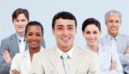 simsearch:6109-06002735,k - Multi-ethnic business people standing with folded arms in front of the camera Stock Photo - Budget Royalty-Free & Subscription, Code: 400-04188470