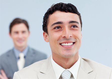 simsearch:6109-06002735,k - Confident business people standing in a row smiling Stock Photo - Budget Royalty-Free & Subscription, Code: 400-04188472