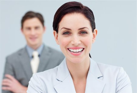 simsearch:6109-06002735,k - Cheerful business people standing in a row looking at the camera Stock Photo - Budget Royalty-Free & Subscription, Code: 400-04188482