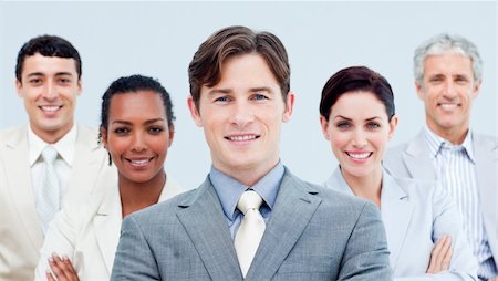 simsearch:6109-06002735,k - Multi-ethnic confident business partners standing with folded arms Stock Photo - Budget Royalty-Free & Subscription, Code: 400-04188483