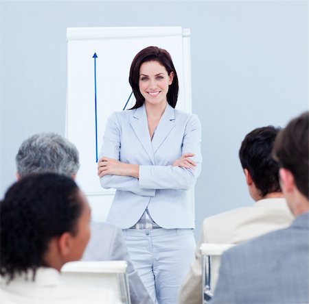 simsearch:400-04188521,k - Positive businesswoman doing a presentation to her colleagues Foto de stock - Super Valor sin royalties y Suscripción, Código: 400-04188508