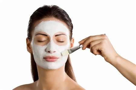 simsearch:400-07952664,k - young woman getting beauty skin mask treatment on her face with brush Foto de stock - Super Valor sin royalties y Suscripción, Código: 400-04189159