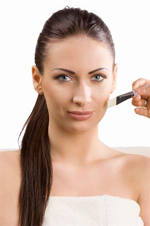 simsearch:400-04127590,k - beautiful woman with white towel getting a beauty treatment with brush on face Stock Photo - Budget Royalty-Free & Subscription, Code: 400-04189252