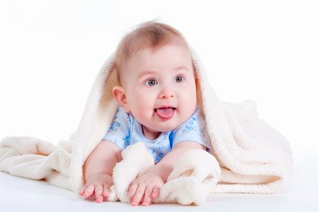 portrait of sweet little baby girl with a blanket - isolated on white Stock Photo - Budget Royalty-Free & Subscription, Code: 400-04189361