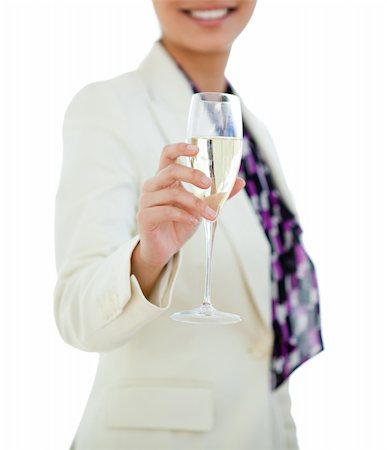 Close-up of a businesswoman holding a glass of Champagne isolated on a white background Foto de stock - Super Valor sin royalties y Suscripción, Código: 400-04189973