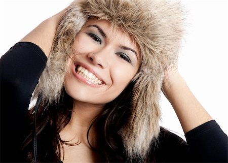 simsearch:400-05712134,k - Adorable young woman with a beautiful smile and wearing a hat Foto de stock - Super Valor sin royalties y Suscripción, Código: 400-04180610