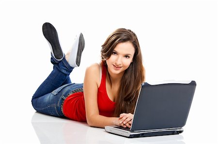 Beautiful and happy girl with a laptop, isolated on white Stock Photo - Budget Royalty-Free & Subscription, Code: 400-04180634