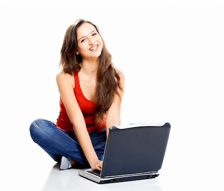 Beautiful young female student with a laptop, isolated on white Stock Photo - Budget Royalty-Free & Subscription, Code: 400-04180635
