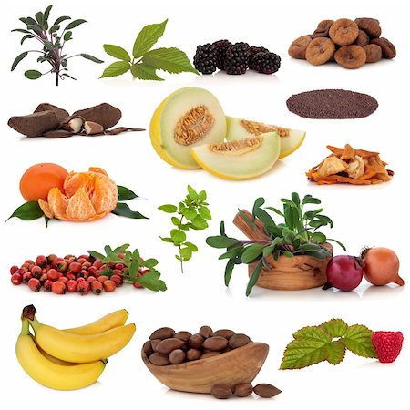 simsearch:400-04180777,k - Super food collection of fruit, nuts, herbs and spices, very high in antioxidants and vitamins, isolated over white background. Photographie de stock - Aubaine LD & Abonnement, Code: 400-04180871