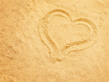 simsearch:614-03455076,k - Valentine background. Heart on the sand Stock Photo - Budget Royalty-Free & Subscription, Code: 400-04181007