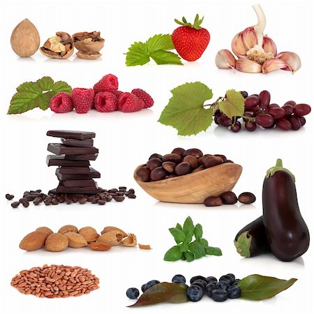 Healthy food collection very high in antioxidants and vitamins, isolated over white background. Photographie de stock - Aubaine LD & Abonnement, Code: 400-04181295