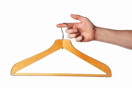 Old wooden clothes hanger hanging from a finger Stock Photo - Budget Royalty-Free & Subscription, Code: 400-04181610