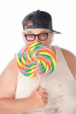 simsearch:400-07305387,k - Large man in tee shirt with lollipop on white background Photographie de stock - Aubaine LD & Abonnement, Code: 400-04181719