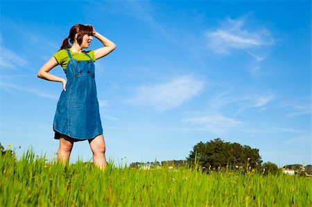 simsearch:400-04201795,k - Portrait of a beautiful woman on a green meadow Fotografie stock - Microstock e Abbonamento, Codice: 400-04181979