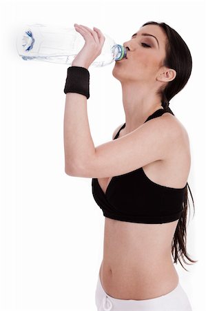 simsearch:400-05880401,k - fitness woman drinking water on a white isolated background Stock Photo - Budget Royalty-Free & Subscription, Code: 400-04182784