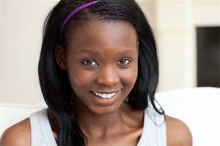 simsearch:400-08296114,k - Portrait of a smiling student against a white background Foto de stock - Super Valor sin royalties y Suscripción, Código: 400-04182937