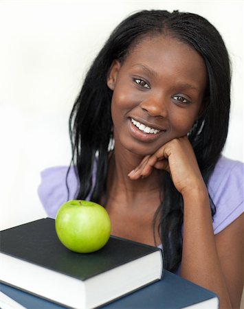 simsearch:400-08296114,k - Portrait of a cheerful teen girl studying Stockbilder - Microstock & Abonnement, Bildnummer: 400-04182978