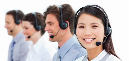 simsearch:400-04188205,k - Assertive business people talking on headset in a call center Stock Photo - Budget Royalty-Free & Subscription, Code: 400-04183004