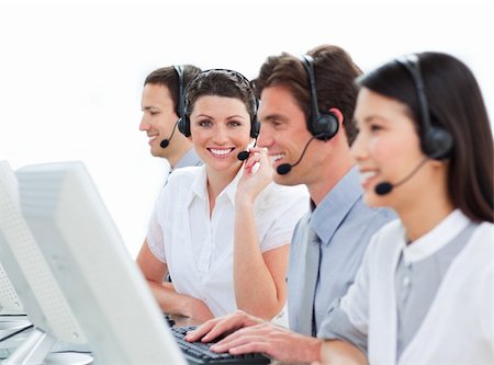 simsearch:400-04188205,k - Cheerful business people talking on headset in a call center Stock Photo - Budget Royalty-Free & Subscription, Code: 400-04183006