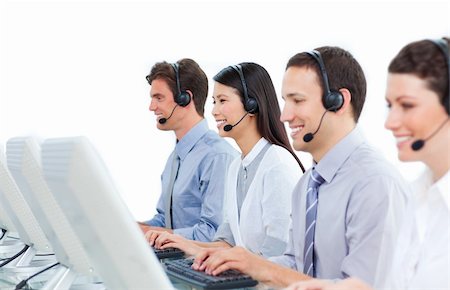 simsearch:400-04188205,k - International business people talking on headset in a call center Stock Photo - Budget Royalty-Free & Subscription, Code: 400-04183001