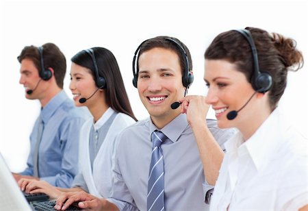 simsearch:400-04188205,k - Confident business people talking on headset in a call center Stock Photo - Budget Royalty-Free & Subscription, Code: 400-04183002
