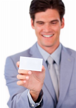 simsearch:400-05718318,k - Charming businessman holding a white card isolated on a white background Foto de stock - Super Valor sin royalties y Suscripción, Código: 400-04183090