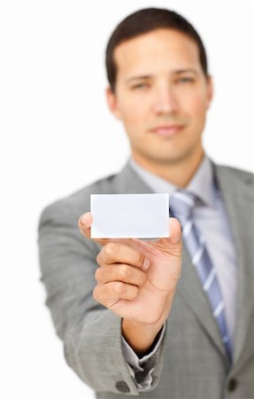 simsearch:400-05718318,k - Serious male executive holding a white card isolated on a white background Foto de stock - Super Valor sin royalties y Suscripción, Código: 400-04183178