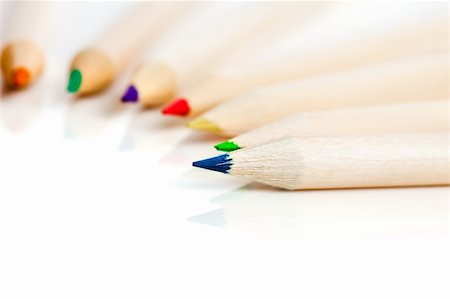 many colored pencils in row over white background Stock Photo - Budget Royalty-Free & Subscription, Code: 400-04183385