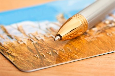 golden pen with credit card Stock Photo - Budget Royalty-Free & Subscription, Code: 400-04183386