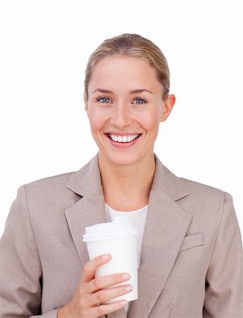 simsearch:400-04188263,k - Positive businesswoman drinking a coffee against a white background Foto de stock - Super Valor sin royalties y Suscripción, Código: 400-04183708