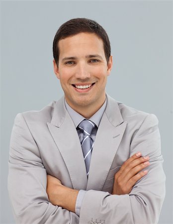 simsearch:400-05118165,k - Attractive businessman with folded arms smiling at the camera Stock Photo - Budget Royalty-Free & Subscription, Code: 400-04183728