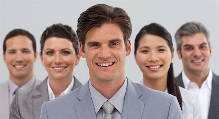 simsearch:400-04097612,k - Smiling business people showing diversity standing in front of the camera Fotografie stock - Microstock e Abbonamento, Codice: 400-04183721