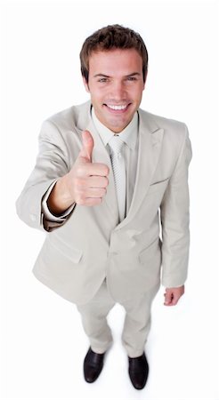 simsearch:400-04129711,k - Positive businessman with thumb up smiling at the camera Stock Photo - Budget Royalty-Free & Subscription, Code: 400-04183744