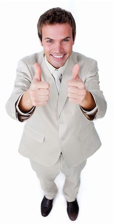 simsearch:400-04129711,k - Victorious businessman with thumbs up smiling at the camera Stock Photo - Budget Royalty-Free & Subscription, Code: 400-04183745