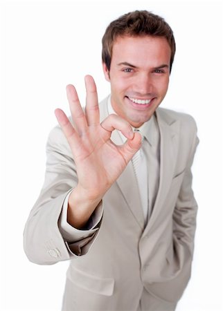 simsearch:400-04129711,k - Charismatic businessman showing OK sign against a white background Stock Photo - Budget Royalty-Free & Subscription, Code: 400-04183771