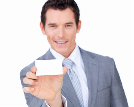 simsearch:400-05718318,k - Self-assured caucasian businessman showing a white card against a white background Foto de stock - Super Valor sin royalties y Suscripción, Código: 400-04183980