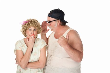 simsearch:400-04188833,k - Funny man sharing a secret with a woman on white background Photographie de stock - Aubaine LD & Abonnement, Code: 400-04194215